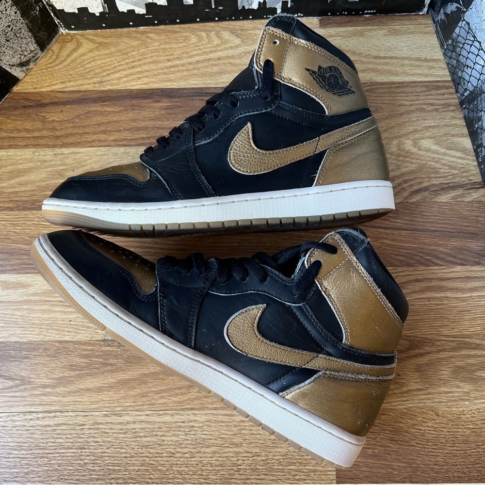Jordan Black and Gold Sneakers
